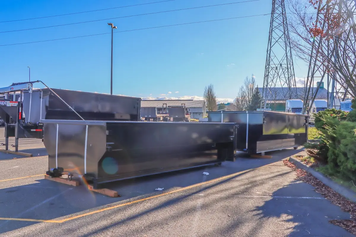 Roll-off dumpster ready for waste disposal at job site for 3 Yard Dumpster Rental in Wayland